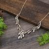 New enamel color hollow irregular petal necklace women's creative simple high-end flower necklace