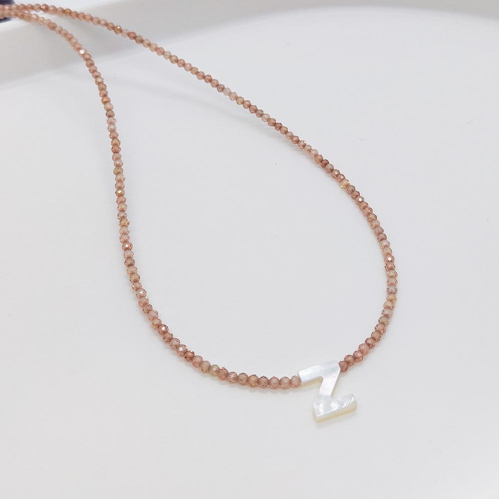 Elegant 2m Zircon Beaded Clavicle Chain: 26-Letter Deep Sea Shell Necklace for Women.