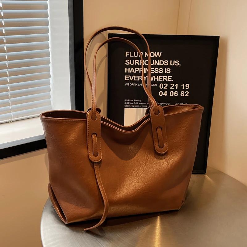 PU Einfarbig Hochwertige Damen-Einkaufstasche Hohe Schönheit Reißverschluss Vielseitige Mode-Umhängetasche Weiche Einfache Beliebte Handtasche