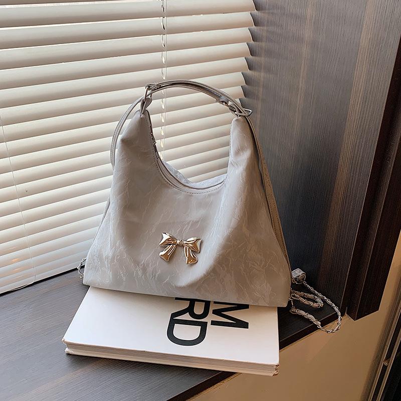 

Textured large-capacity backpack women s 2024 new fashion textured shoulder bag commuter bucket bag срібний