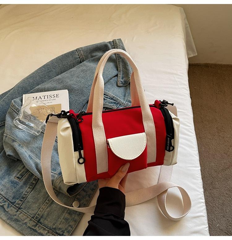 

Japan and South Korea couple Boston bag 2025 new shoulder cylinder bag women s contrasting color large capacity minimalist messenger bag красный