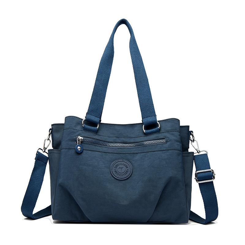 

Жіноча сумка через плече легка нейлонова сумка з кількома кишенями великої місткості темно-синього кольору