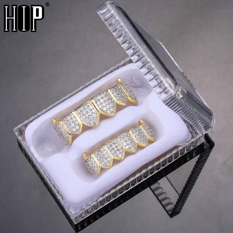 

Хип-хоп Iced Out Teeth Grillz Caps Кубический циркон Micro Pave Верх и низ Очаровательные грили Набор для мужчин и женщин Коробка для ювелирных изделий