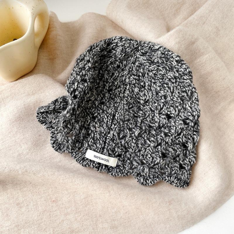 Wool knitted stacking hat women's autumn and winter new warm high-end solid color crimped ear protector wool hat