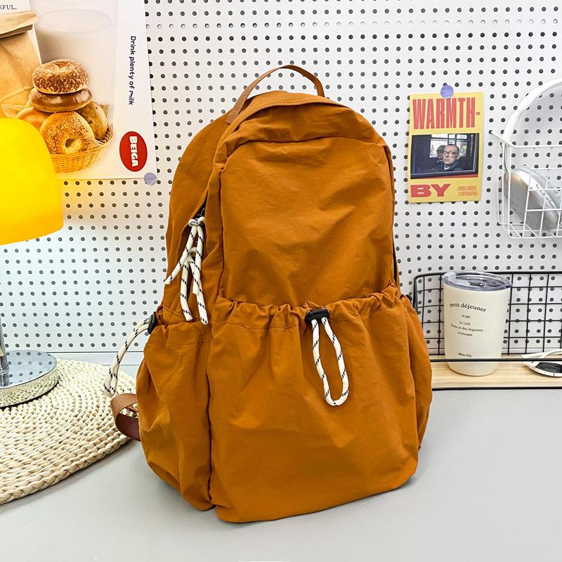 Schoolbag Solid Color Nylon Backpack Women's 1011 Summer New Large Capacity Middle and High School Student School Bag Lightweight Travel Bag