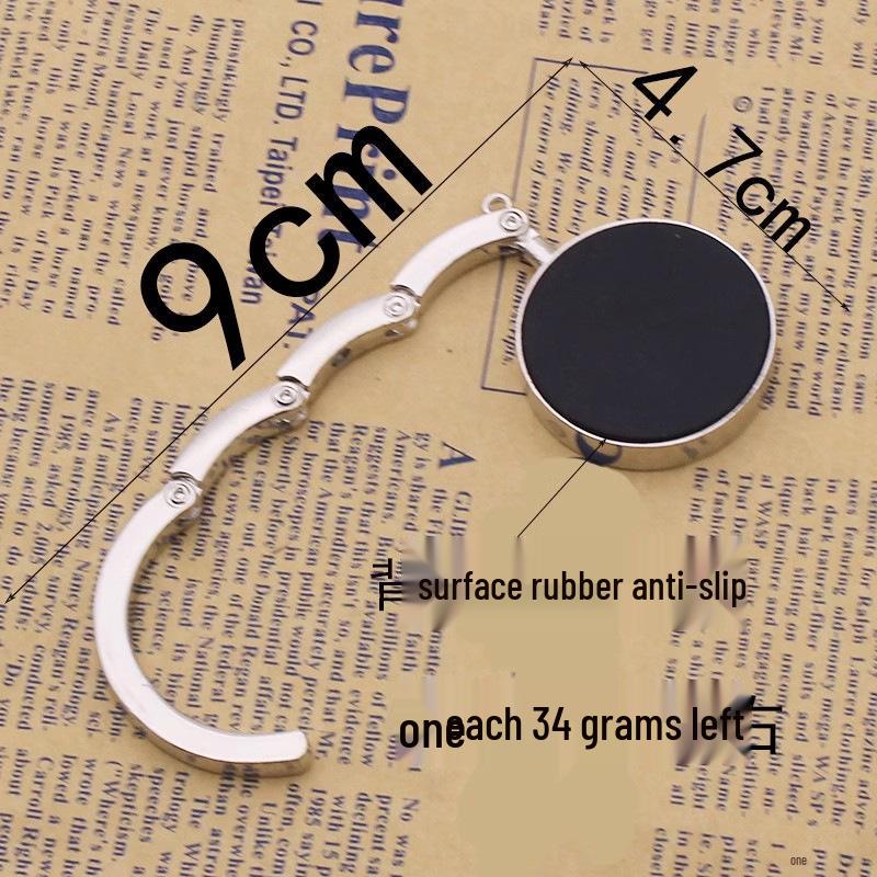 Tragbarer Faltbarer Handtaschenhaken - Kreatives Rundes Metall-Souvenir