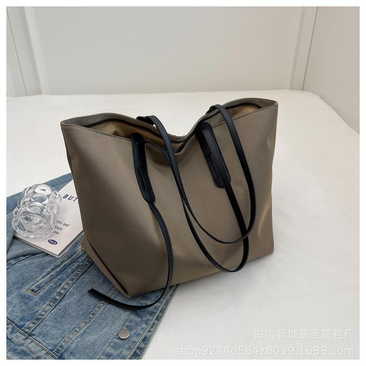 

Summer new large-capacity women s bags 2025 new Korean version of popular fashion versatile single shoulder portable tote bag хаки