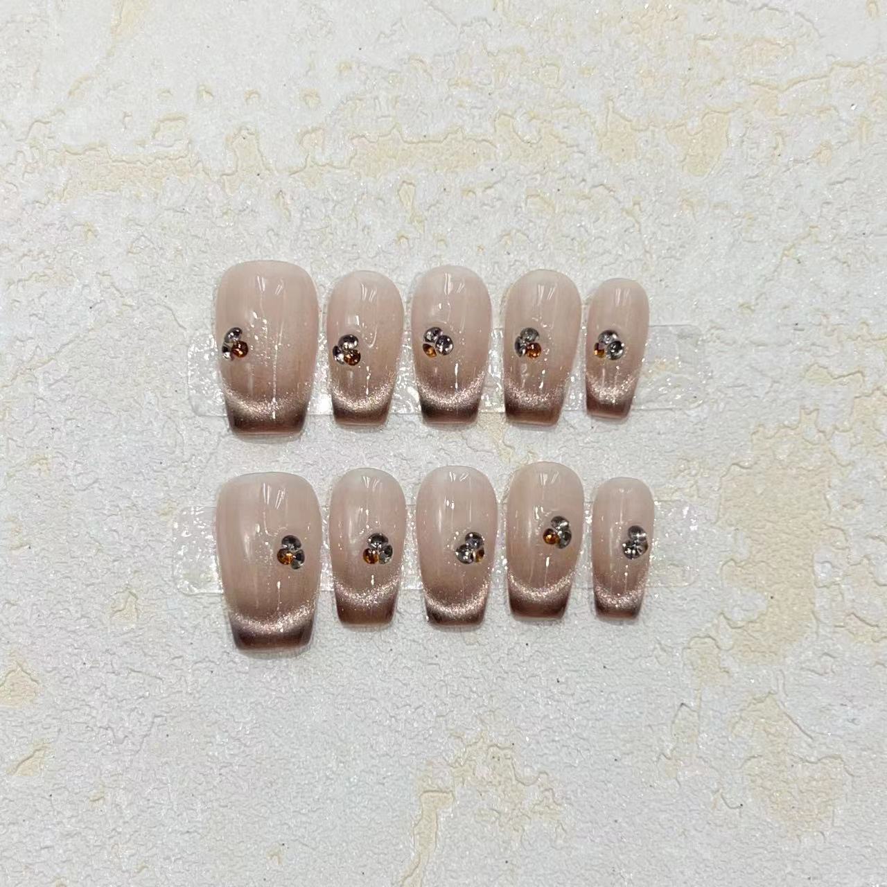 

Ношение брони Ручная работа Осенне-зимний стиль Мокко Кошачий глаз Французский градиент Телесный цвет Блестящий Острый Бриллиант Нарукавная броня Large L