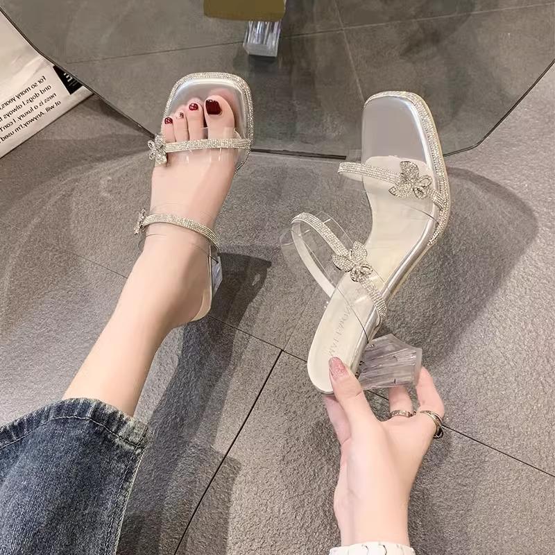 Fairy wind high-heeled slippers female summer wear 2025 new transparent rhinestone one-word drag crystal thick-heeled cool slippers