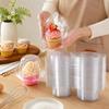 Individual Dessert Packages in Clear Plastic with Hinged Domed Covers and Fold-Over Fasteners for Takeout Display