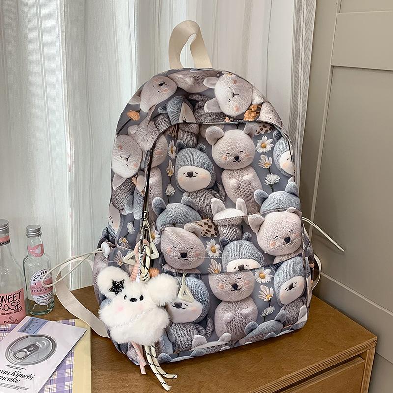 High value, fresh, sweet and cute printed backpack, lightweight make-up class for junior high school students, and large-capacity backpack.