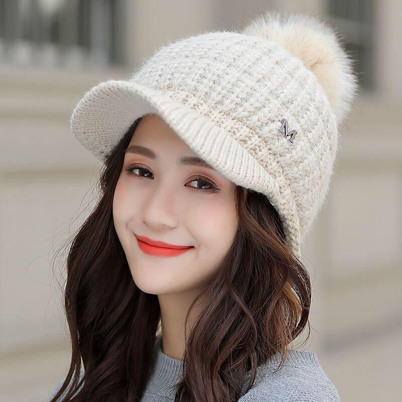 Peaked cap women's new knitted wool warm hat fashion versatile autumn and winter piled thickened ear hat