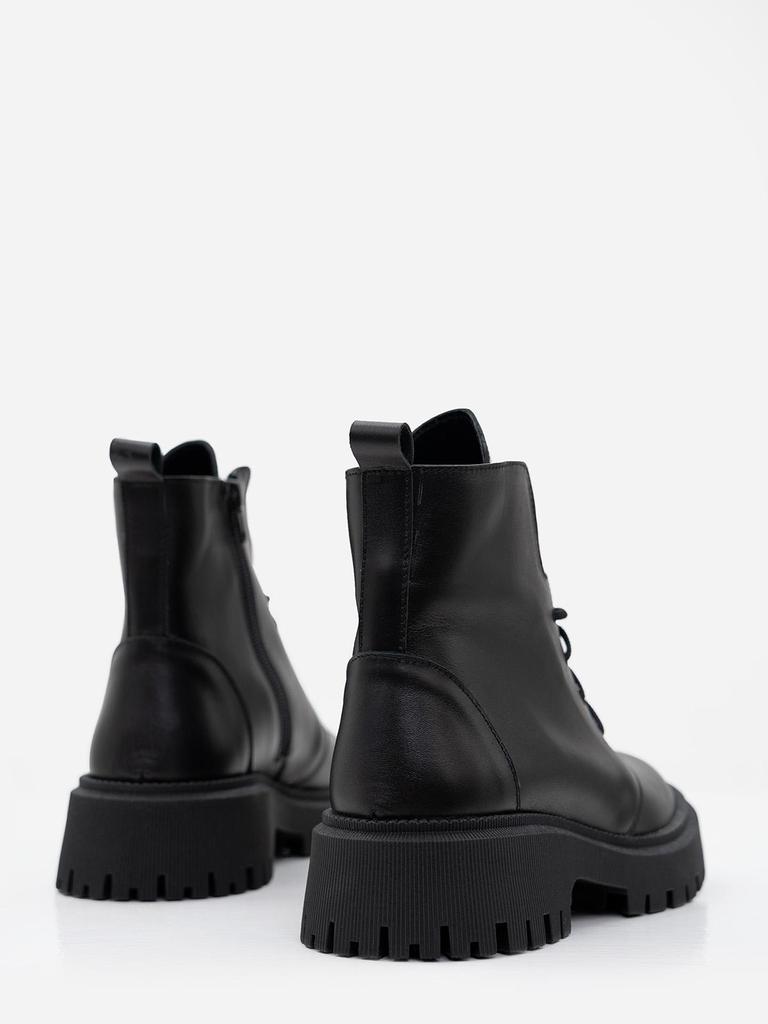 Black Leather Boots On ISSA Plus Bike