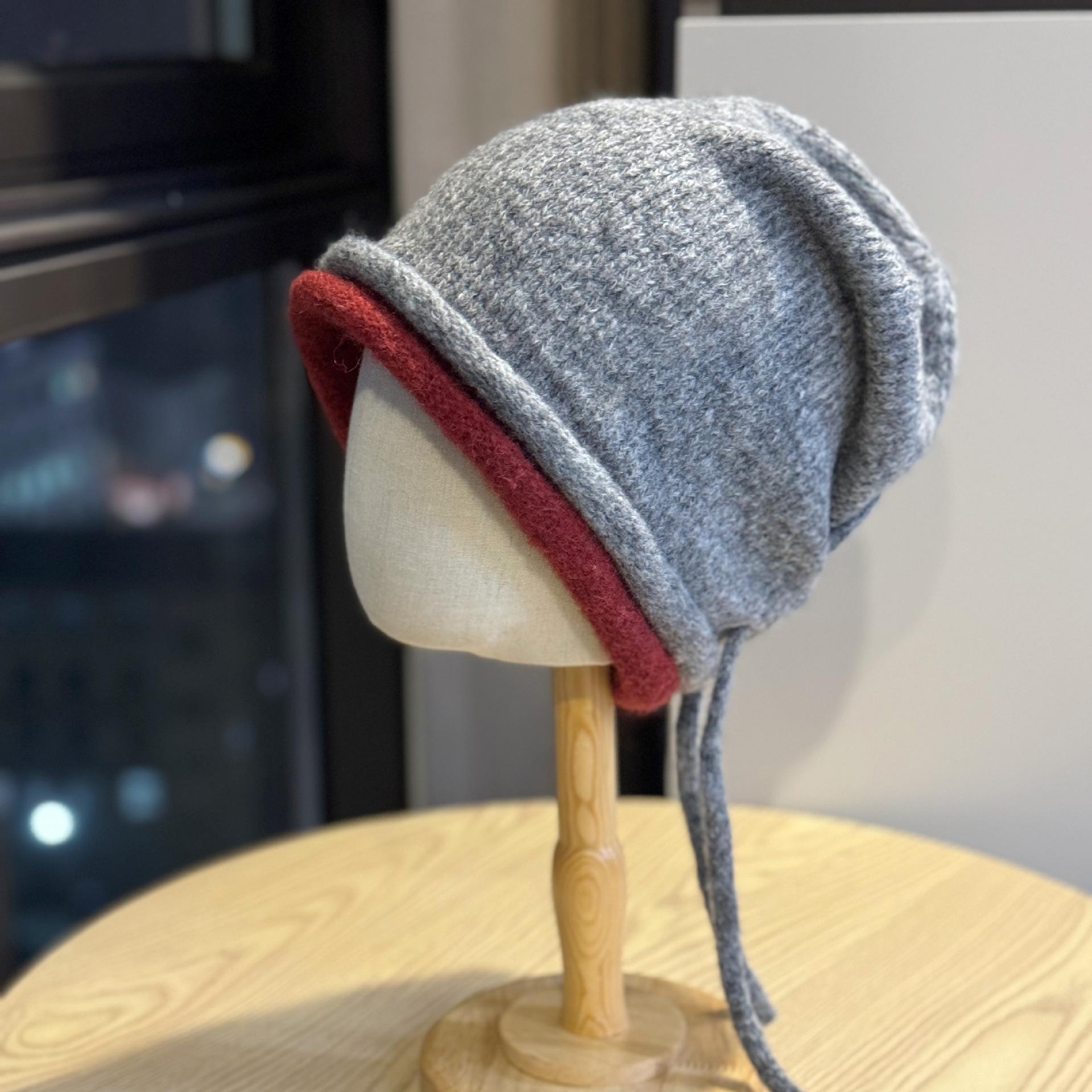 

Korean-style autumn and winter drawstring rolled-edge knitted hat for women, simple and warm, makes the head look smaller, beanie hat Adult54-60Average Size сірий колір