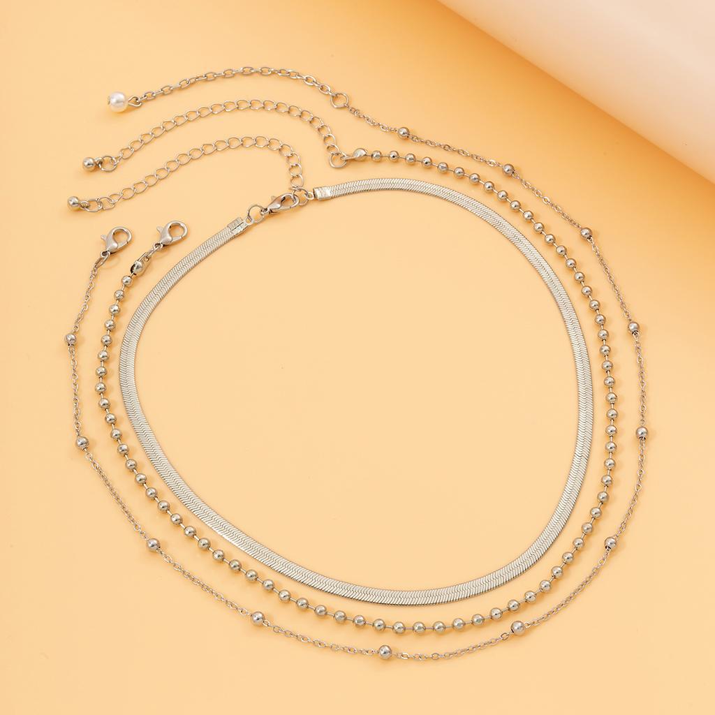 Niche Baroque Tassel Imitation Pearl Versatile Necklace Retro Stacked Metal Snake Bone Chain Simple Necklace