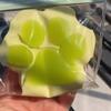 Cement-feel cat paw squeeze toy with slow rebound, green grape and orange stress relief.