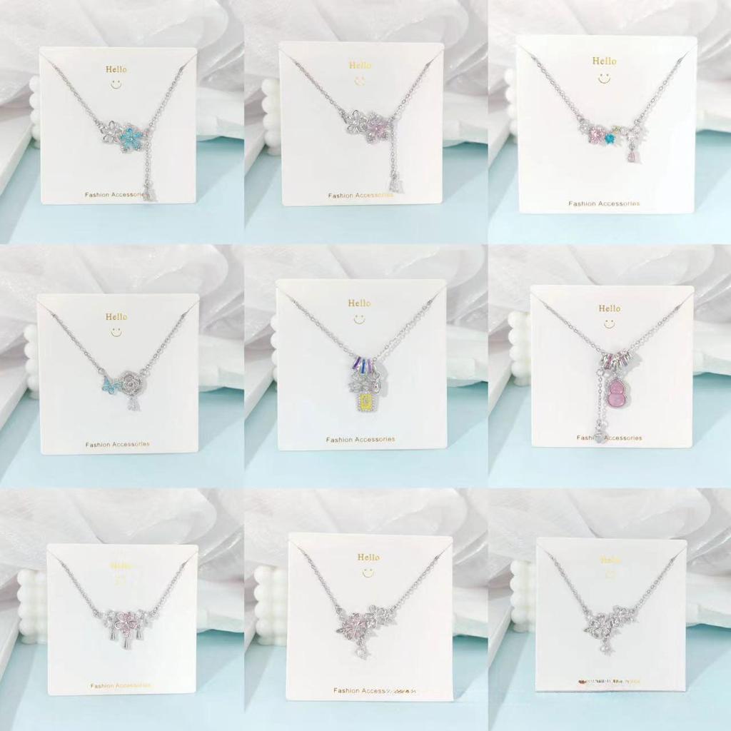 Pink Zircon Gourd Pendant Necklace with Floral Tassels - Titanium Steel Clavicle Chain for Women's Light Luxury.