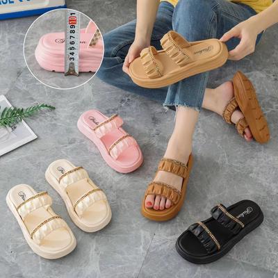 Sommer neue weichsohlige Slipper für Damen zum Tragen 2025 modische und ausgefallene dicksohlige Strand Ein-Riemen coole Slipper