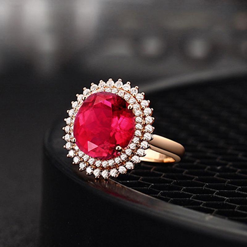 Pierścionek z różowego złota 18K z czerwonym turmalinem i cyrkonią diamentową