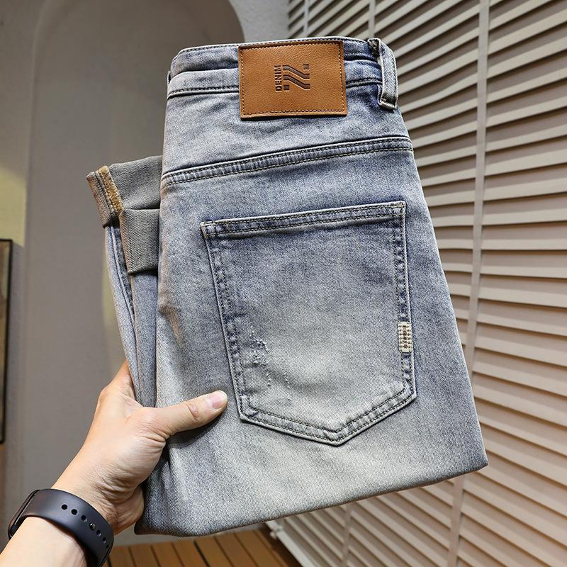 

Весенние джинсы светло-голубые маленькие рваные укороченные брюки стрейч мужские брюки 38