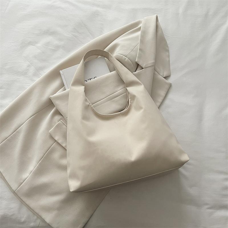 Einfache Textur trendige Damen-Tragetasche Herbst und Winter neue Tasche Mode lässige Persönlichkeit Schultertasche