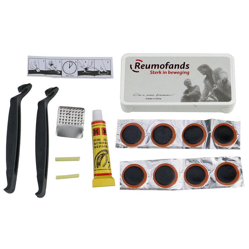 Bicycle Tire Repair Kit: Includes Glue, Patches, Rasp, and Pry Bars.