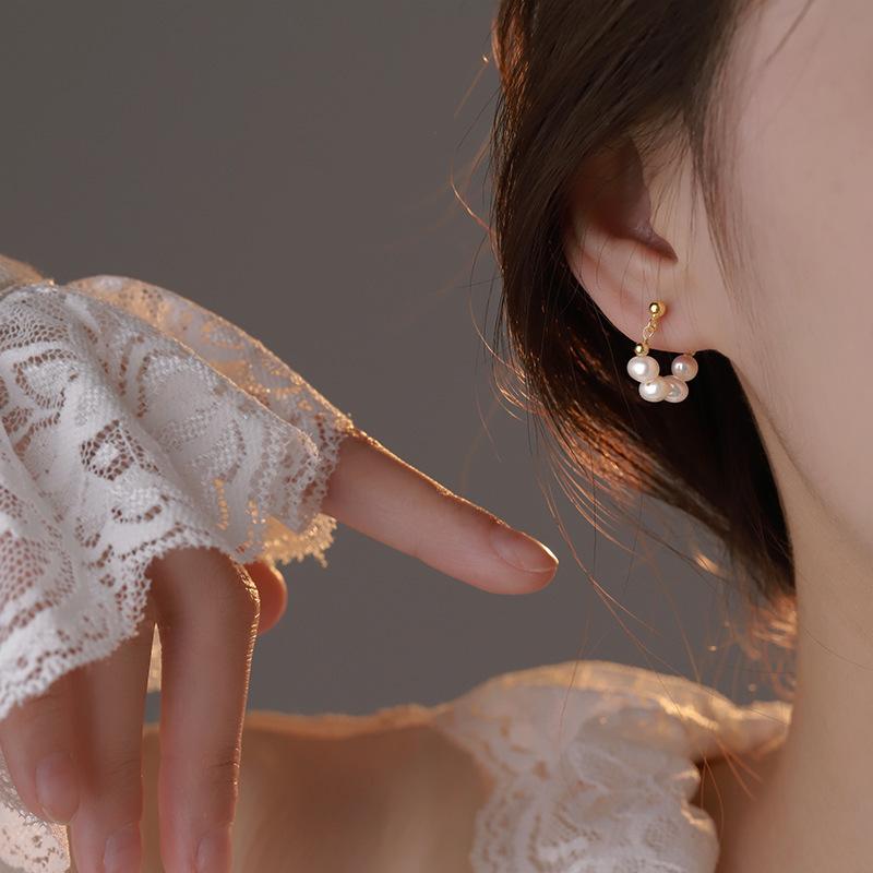 

Korean pearl earrings women s retro French temperament high-end sense light luxury spring stud earrings tide earrings