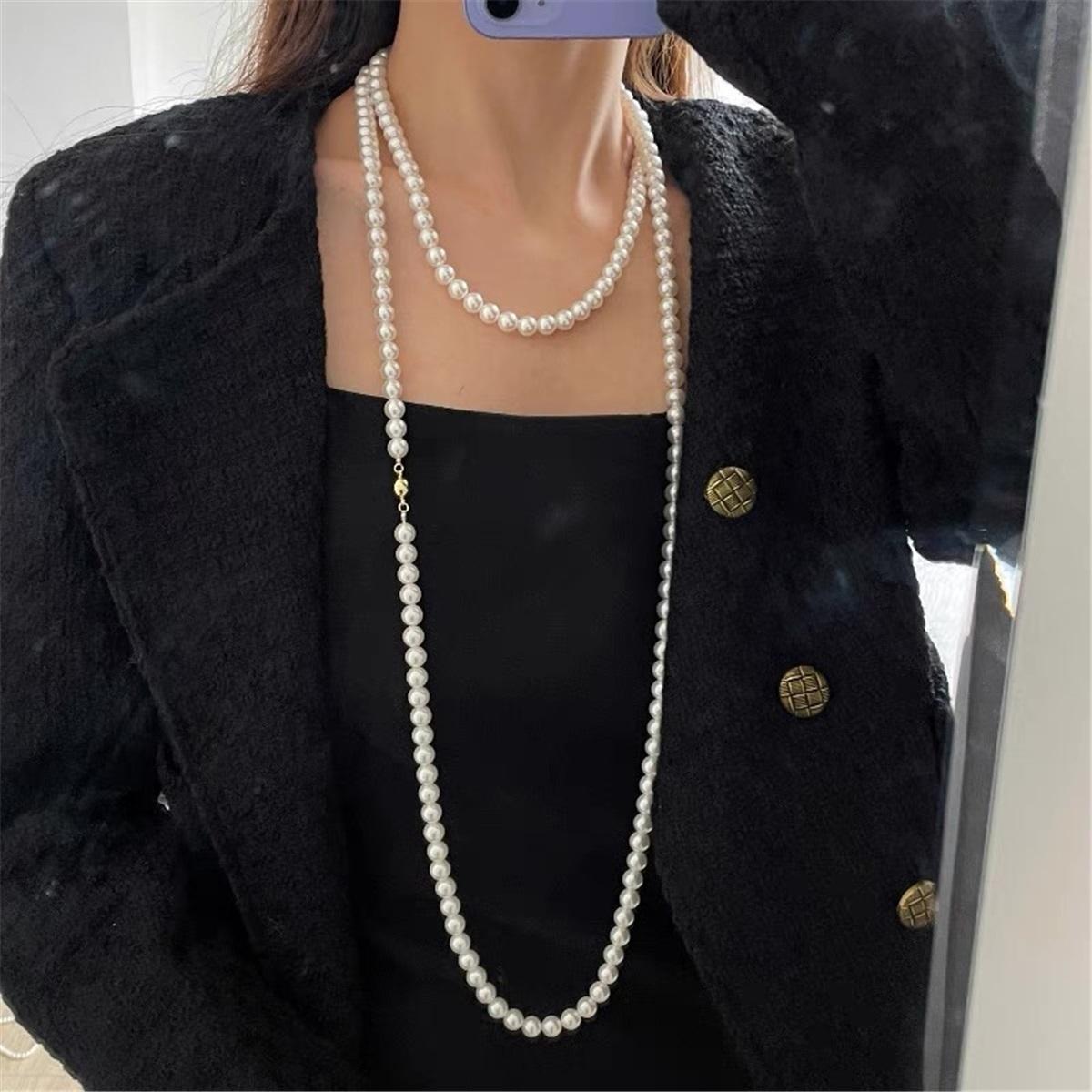 

Tooxika Модный темперамент Многослойное наложение Магнитная застежка Жемчужное ожерелье Длинная легкая роскошная цепочка-джемпер Аксессуары Ожерелье