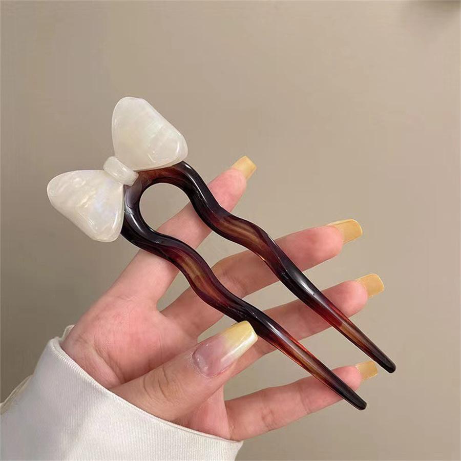 

Summer retro bow acetic acid U-shaped hairpin fashionable ladies high-end hairband new meatball hair clip hair accessories