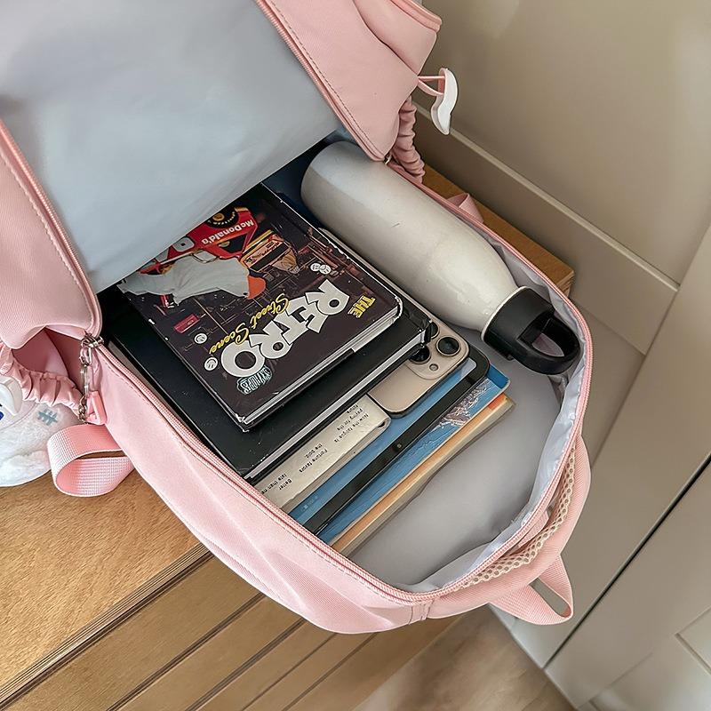 The new schoolbag is high-value, fresh and sweet, candy-colored backpack, contrasting color splicing, and lightweight travel backpack.