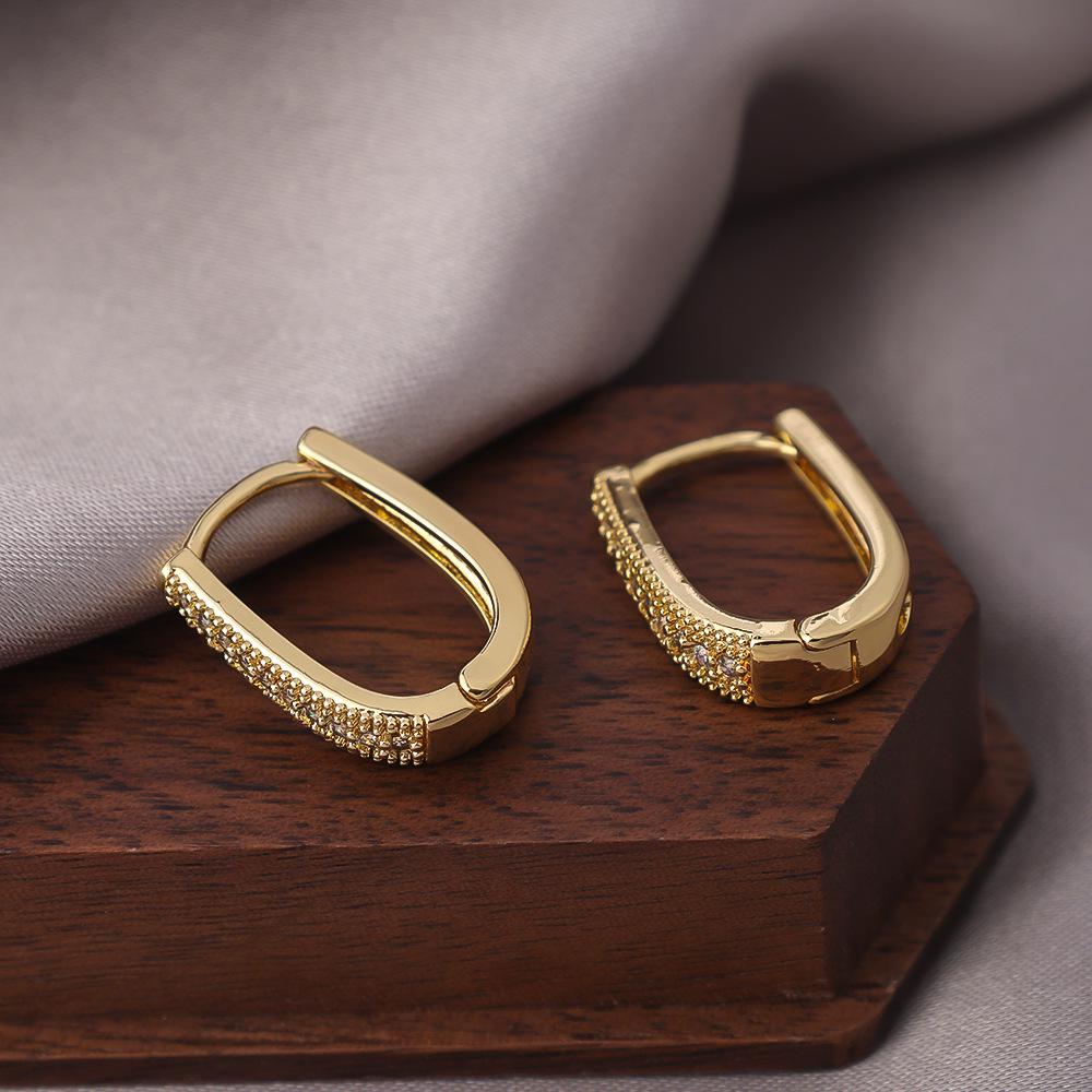 

FEEHOW Diamond-Set Earrings: Luxury Ear Cuffs & Hoops - Simple, High-End Fashion.