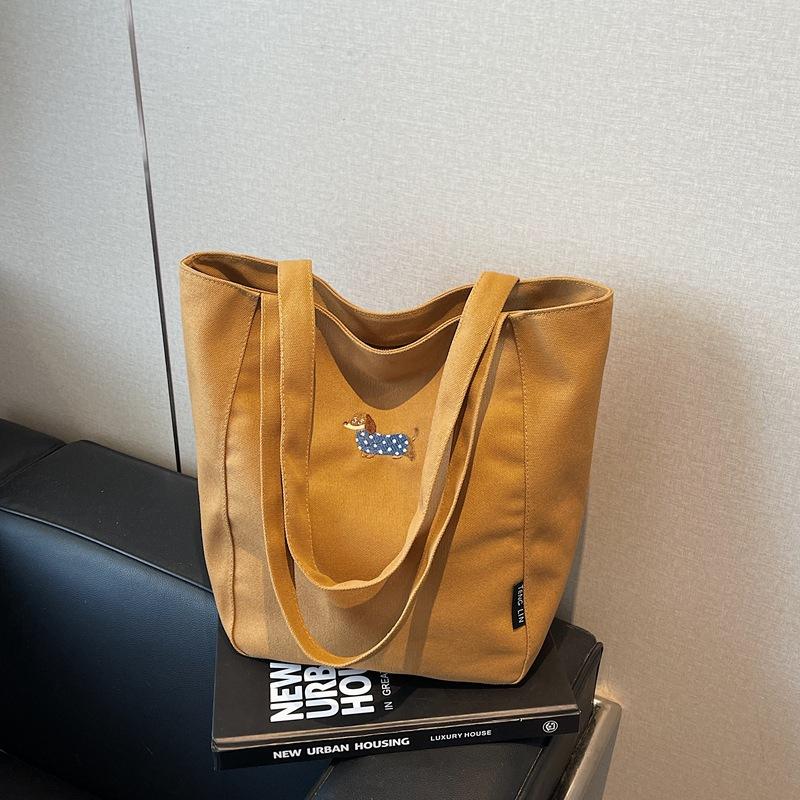 Canvas bag women's large-capacity new literary and artistic shoulder bag college students commuting tote bag