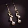 Boucles d'oreilles élégantes pour femmes avec longues chaînes et pampilles, imitation perle, pendentif superposé, bijoux