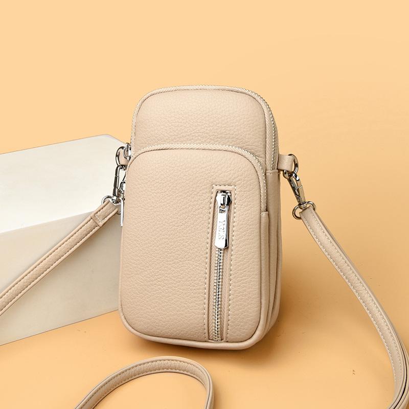 Single-shoulder Crossbody Fashion and Simple Lock-style Small Bag Made of Cowhide, Suitable for Mobile Phone Use.