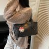 Herbst und Winter neue High-End-Textur Retro Nischen-Tasche Damen College-Studentin Pendeln Schulter-Tragetasche