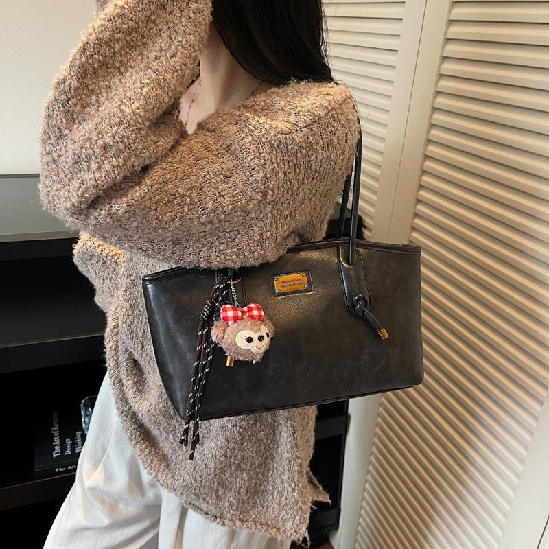 Herbst und Winter neue High-End-Textur Retro Nischen-Tasche Damen College-Studentin Pendeln Schulter-Tragetasche