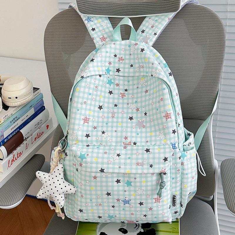 Schoolbag new schoolbag female junior high school student star printing Korean version niche ins backpack Mori college student computer bag