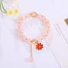Kristall-Perlen-Blumenarmband - Koreanischer Stil, Geschenk für die beste Freundin, Kleines Gänseblümchen-Design, Frisch und Süß.