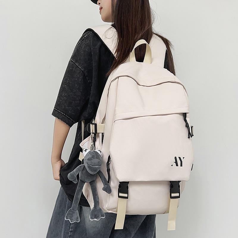 High value niche design backpack couple solid color simple lightweight large capacity backpack