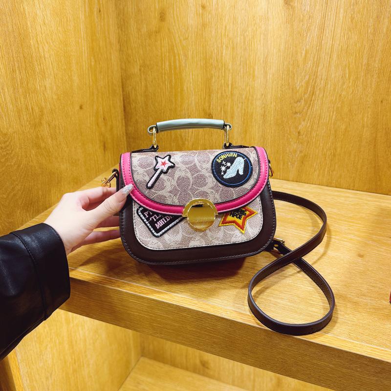 Bag women's new women's bag hot-selling contrasting color handbag badge decoration shoulder small square bag tide