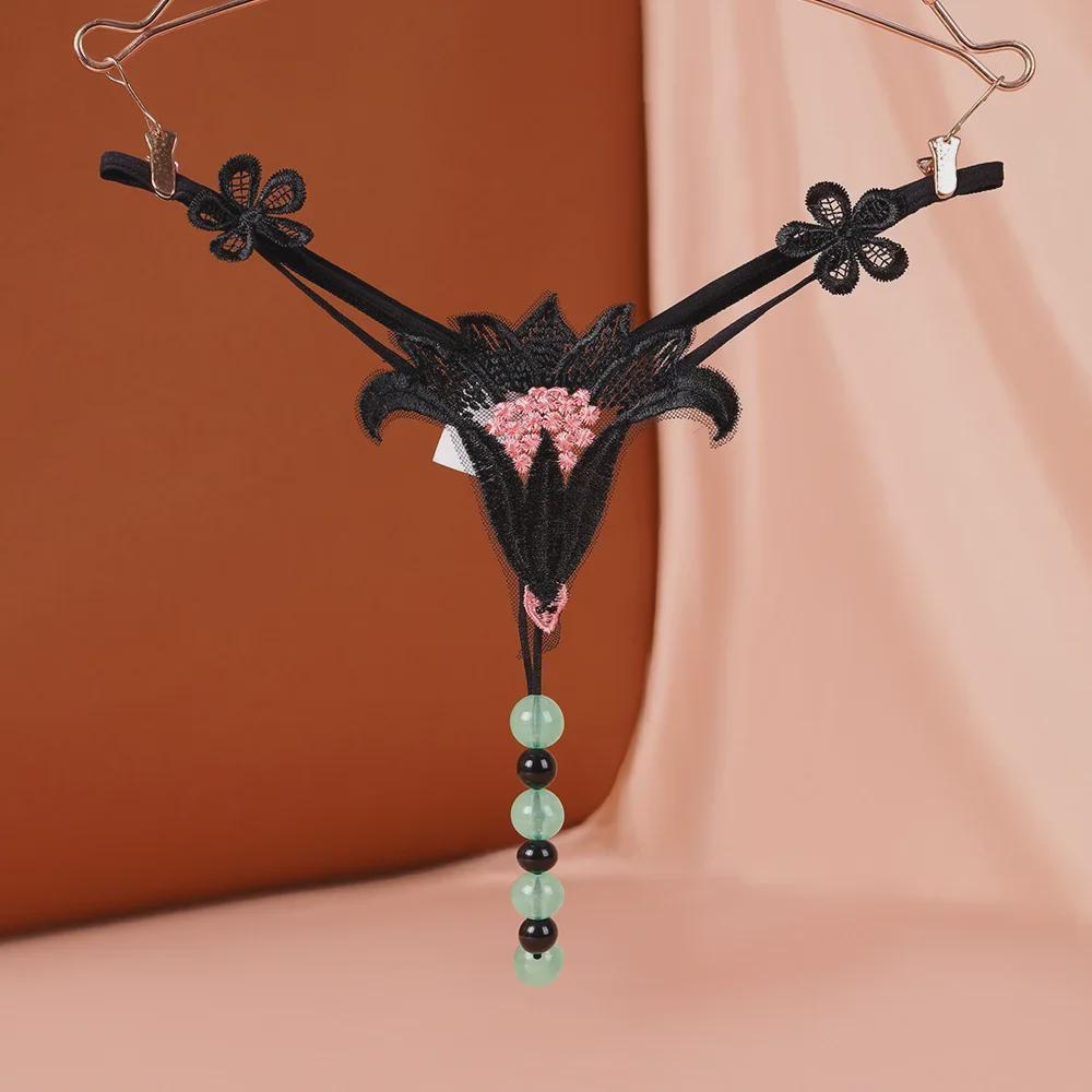 "Luminous Pearl Massage Open-Crotch Thong for Women: Sexy Nightclub Underwear"