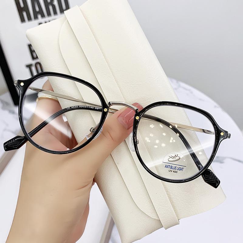 A Woman With A Big Face Wearing Glasses And Having Myopia Is Protecting Herself From Blue Light.