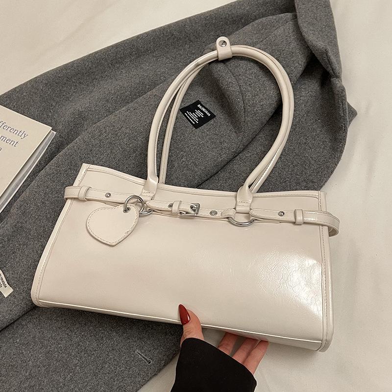 Frühling Neuprodukt Nischendesign personalisierte Ölwachsleder Achsel-Baguettetasche vielseitig Pendeln Temperament tragbare Umhängetasche Damen