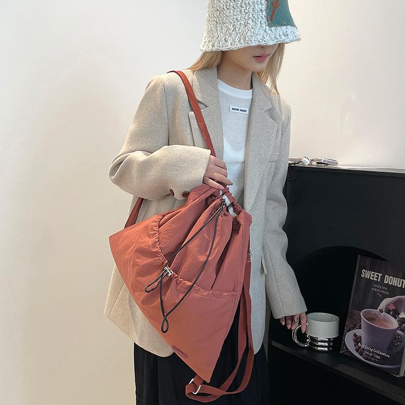 Niche daily leisure lightweight sports drawstring backpack commuter student schoolbag