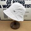 New simple solid color bucket hat women's summer metal label light and thin sunscreen versatile face small sunshade sun hat
