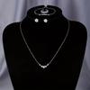 Simple and Stylish Zirconia Jewelry Set: Pendant Necklace, Adjustable Bracelet, Open Ring, and Earrings - a Perfect Holiday Gift