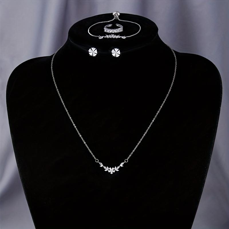 Simple and Stylish Zirconia Jewelry Set: Pendant Necklace, Adjustable Bracelet, Open Ring, and Earrings - a Perfect Holiday Gift