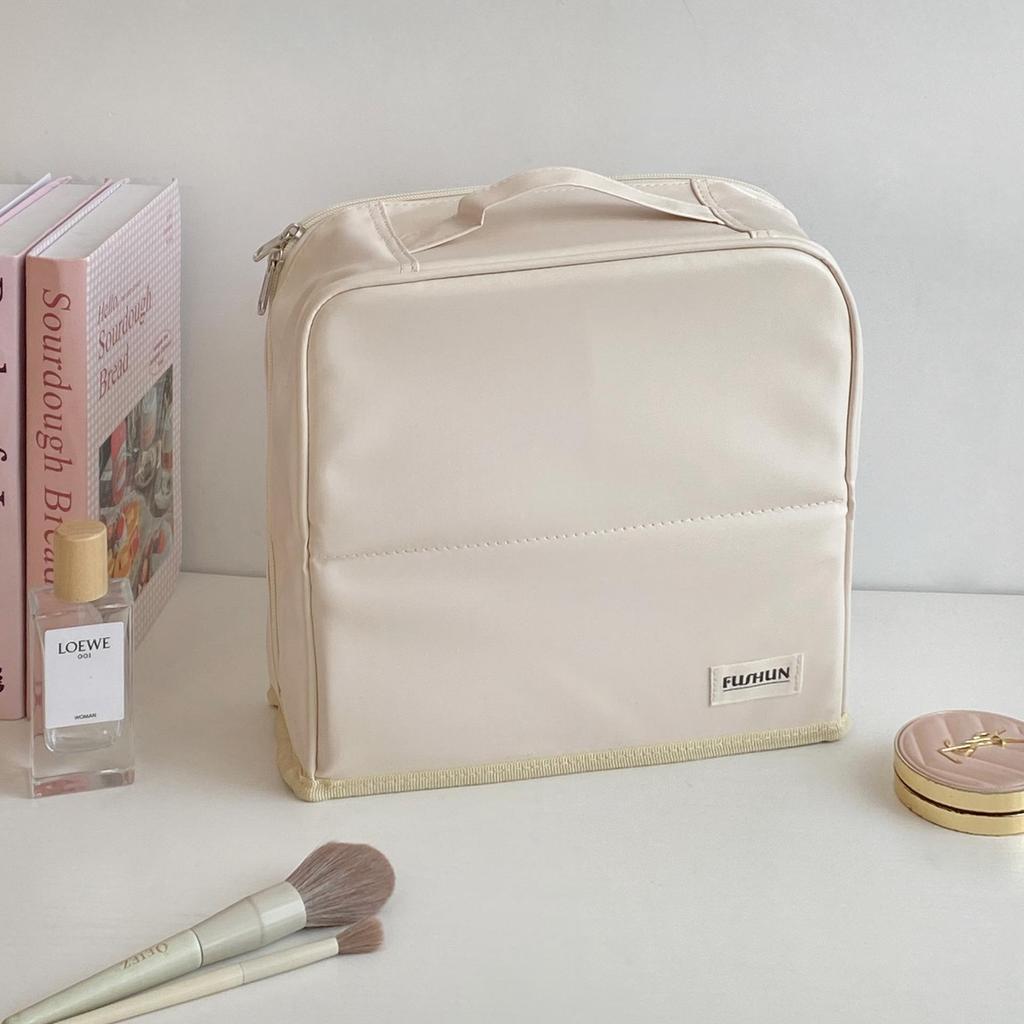 Portable Large Capacity Makeup Bag with Mirror, Hangable on Suitcase, Compartmentalized Cosmetic Storage Pouch.