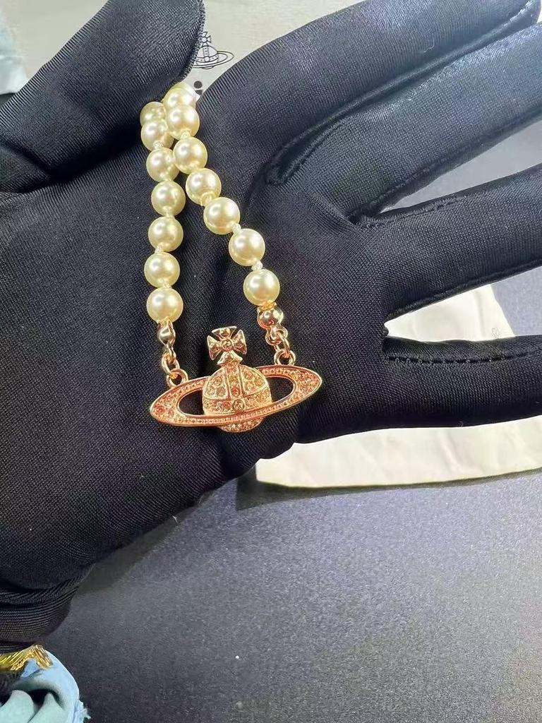 Vivienne Westwood Saturn Pearl Necklace: Women's Luxury Choker with Vivienne's Planet Clavicle Chain
