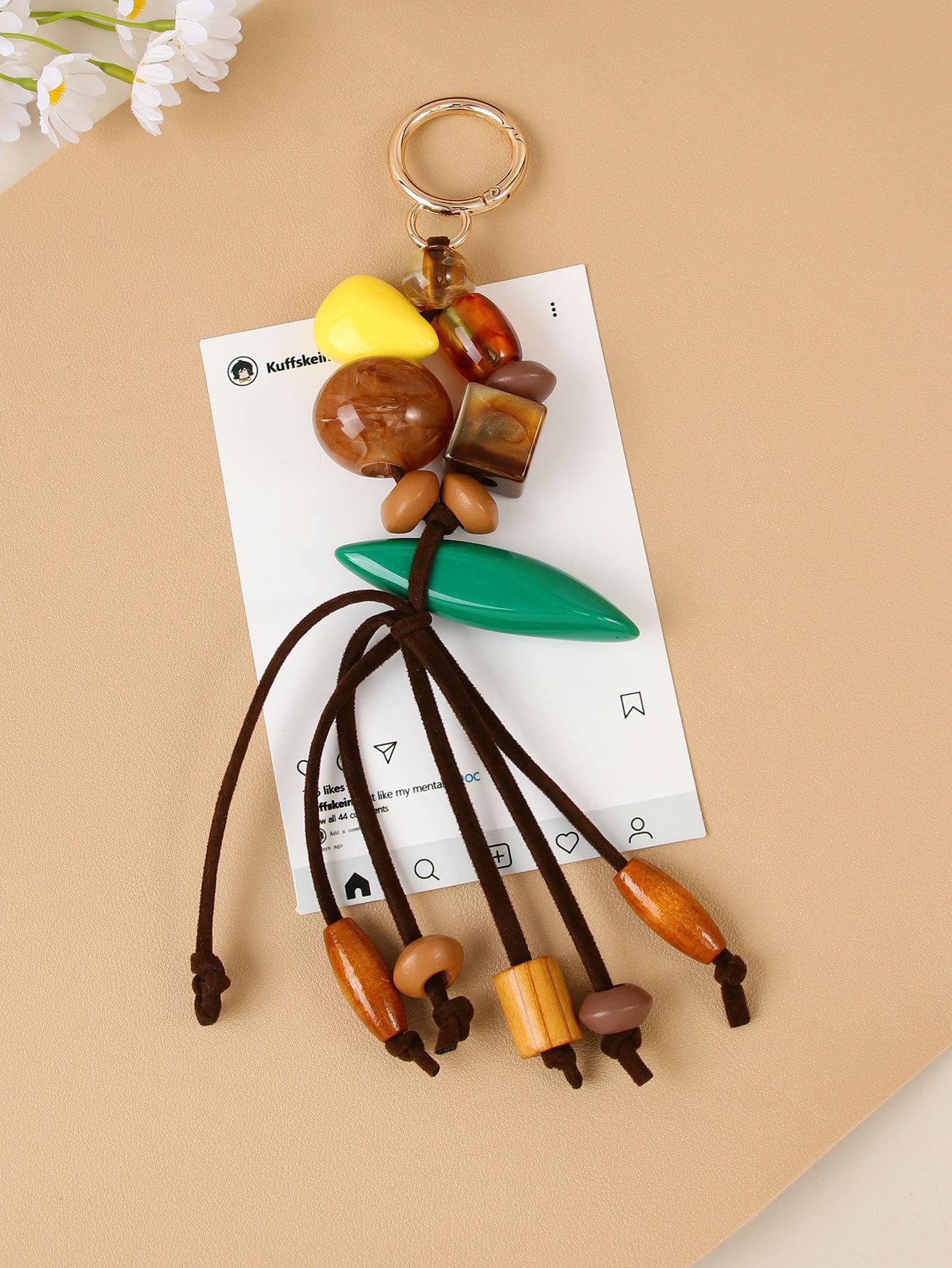 Creative retro casual versatile handmade beaded bag pendant Bohemian wood bead resin bead fringed braided rope pendant зелёный